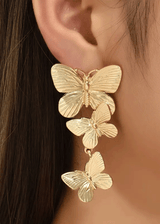 Aretes colgantes de mariposa