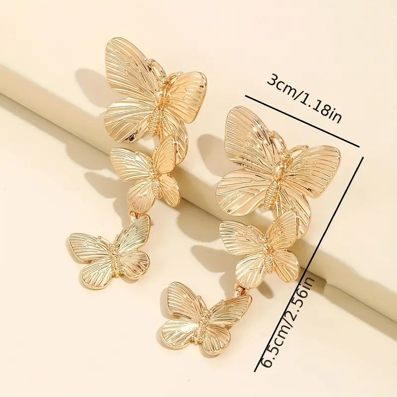 Aretes colgantes de mariposa