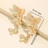 Aretes colgantes de mariposa