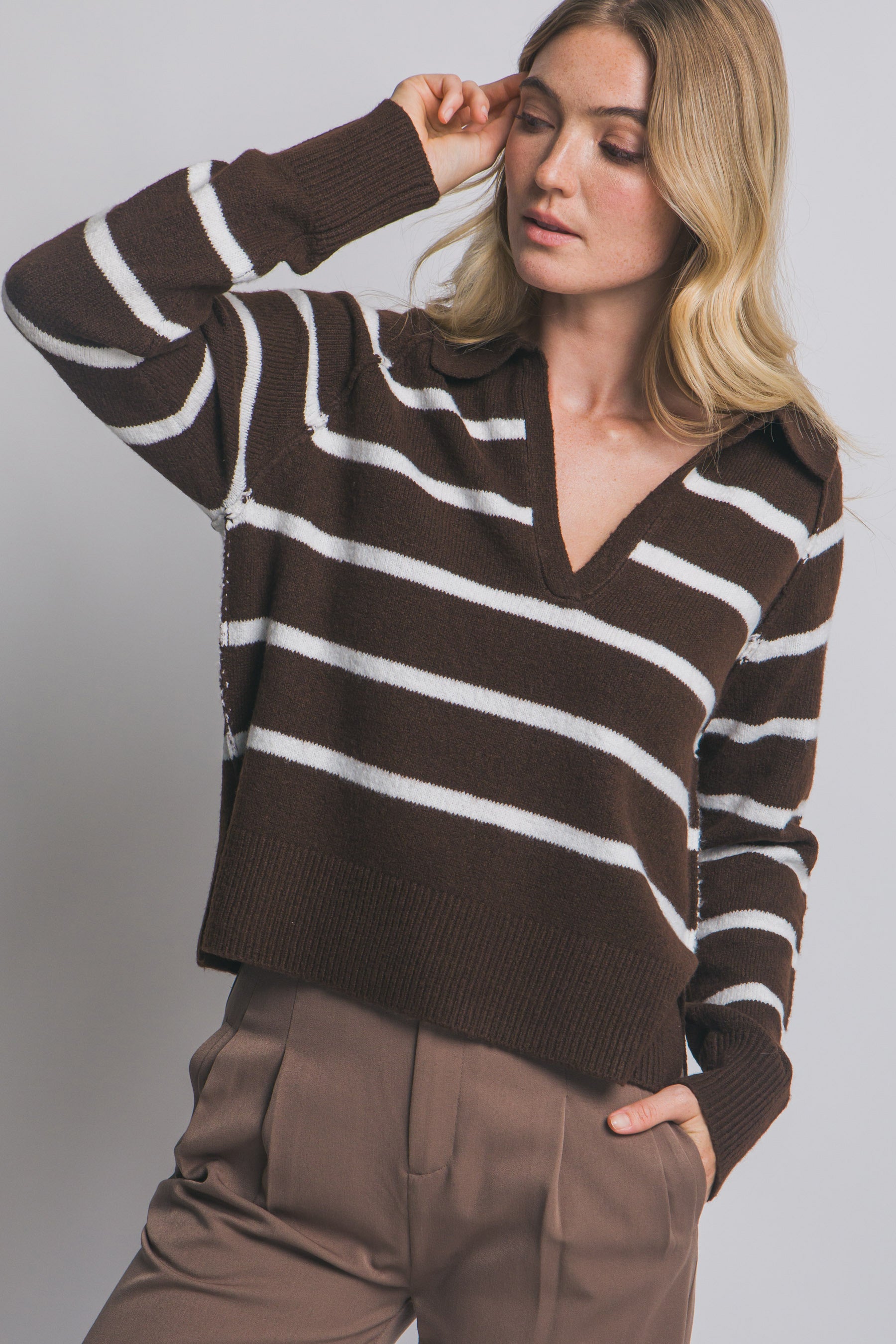 Suéter tejido tipo polo