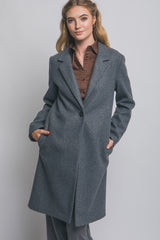 Abrigo largo con botón