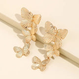 Aretes colgantes de mariposa