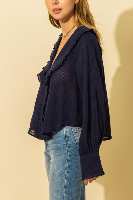 Blusa con cuello de volantes