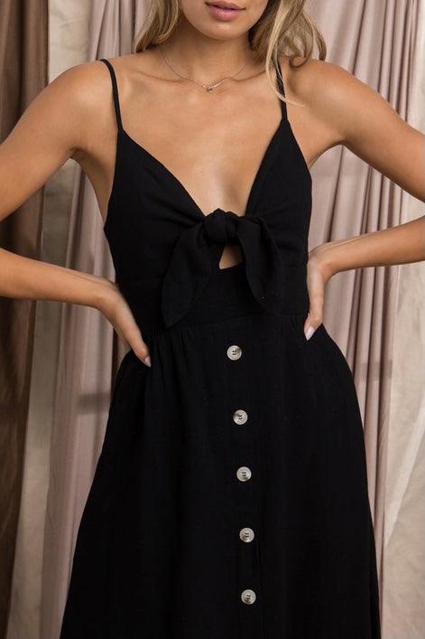 Vestido midi con moño enfrente