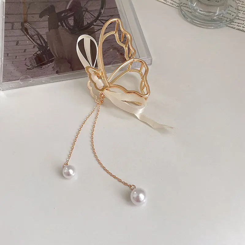 Pinza metálica para el cabello