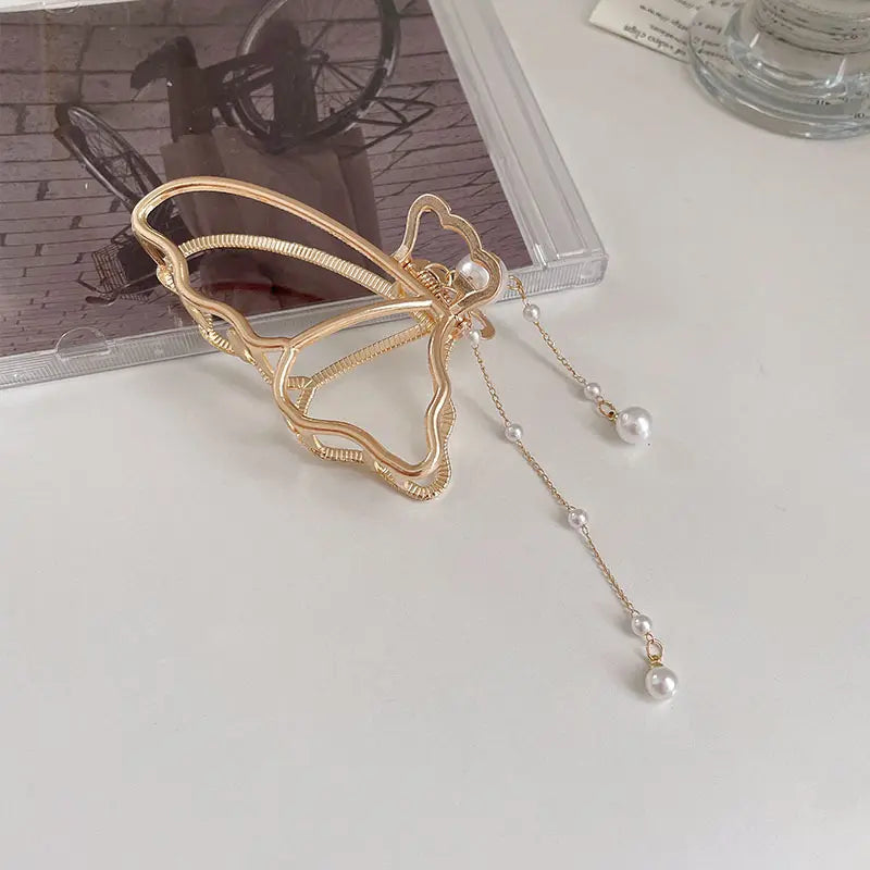 Pinza metálica para el cabello