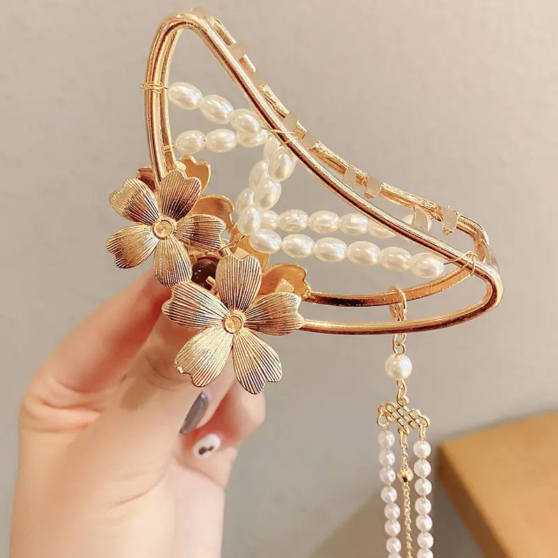 Pinza metálica para el cabello